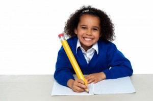 Girl holding a big pen ID-100155119